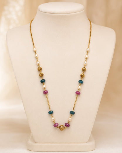 FeelOri gold-polished necklace on jewellery display