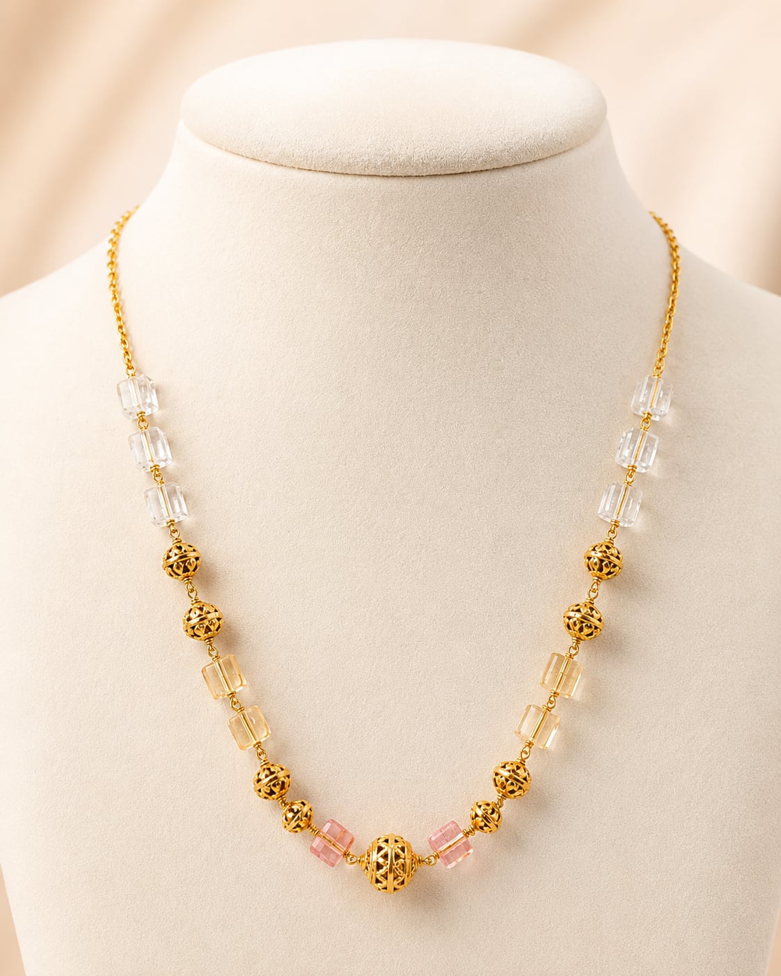 FeelOri gold-polished necklace on jewellery display