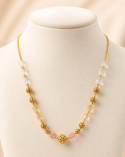 FeelOri gold-polished necklace on jewellery display