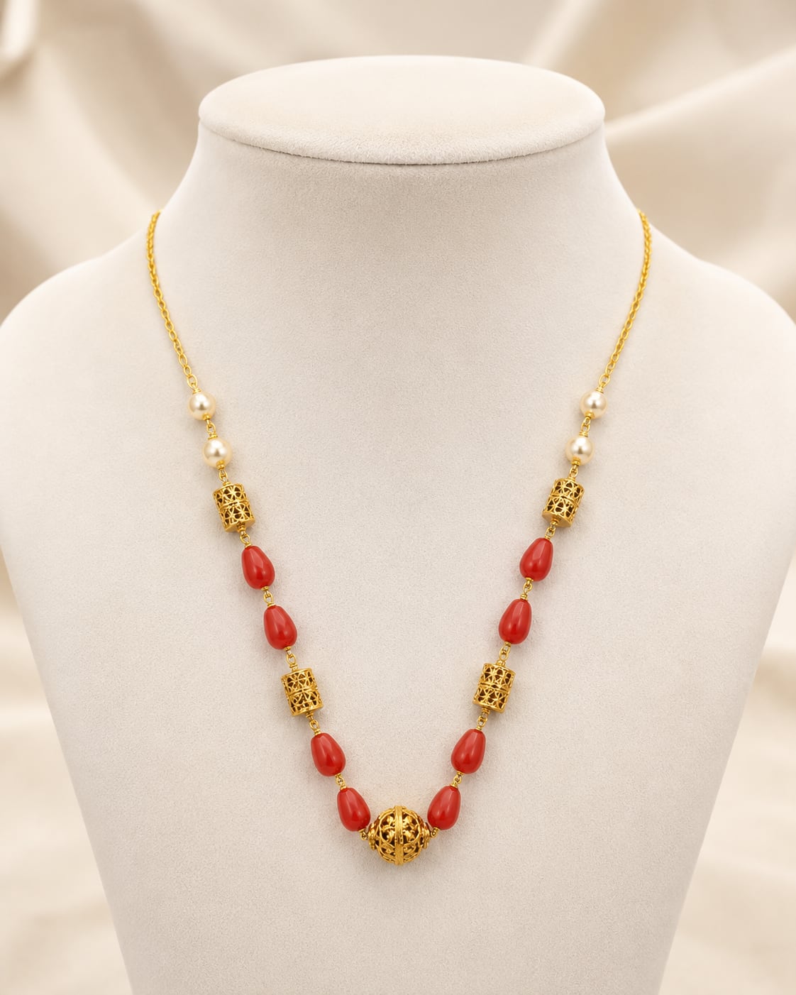 FeelOri gold-polished necklace on jewellery display