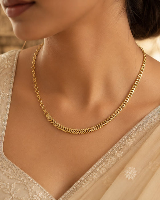 FeelOri gold-polished necklace styled with Indian occasion wear