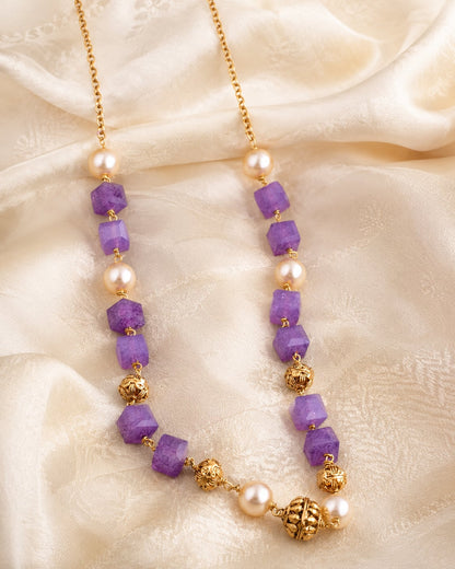 FeelOri gold-polished necklace styled with saree fabric for Indian occasion wear
