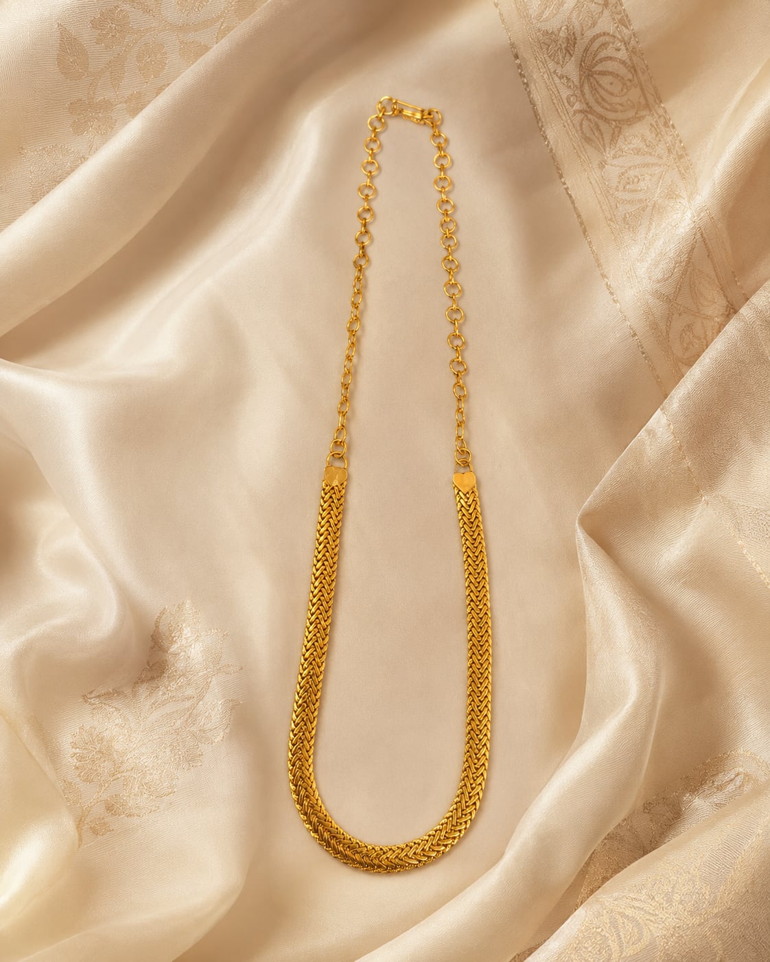 FeelOri gold-polished necklace styled with saree fabric for Indian occasion wear