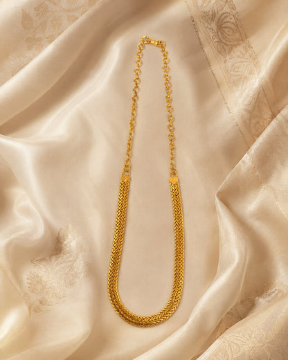 FeelOri gold-polished necklace styled with saree fabric for Indian occasion wear
