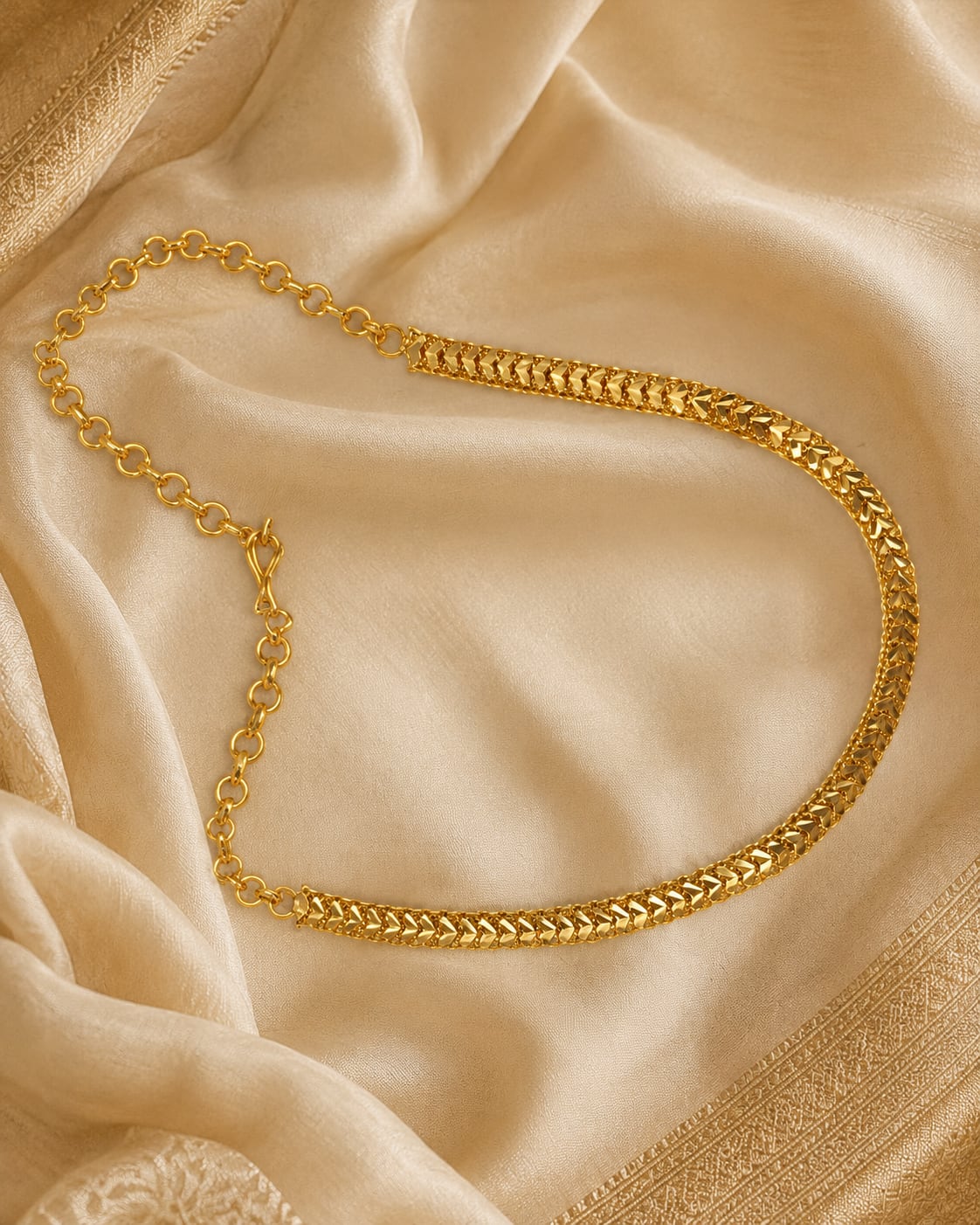 FeelOri gold-polished necklace styled with saree fabric for Indian occasion wear