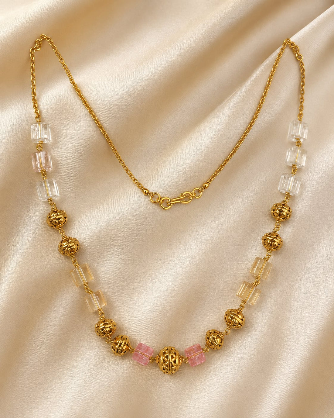 FeelOri gold-polished necklace styled with saree fabric for Indian occasion wear