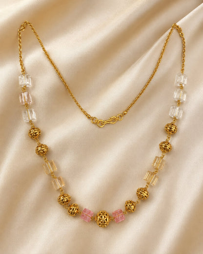 FeelOri gold-polished necklace styled with saree fabric for Indian occasion wear