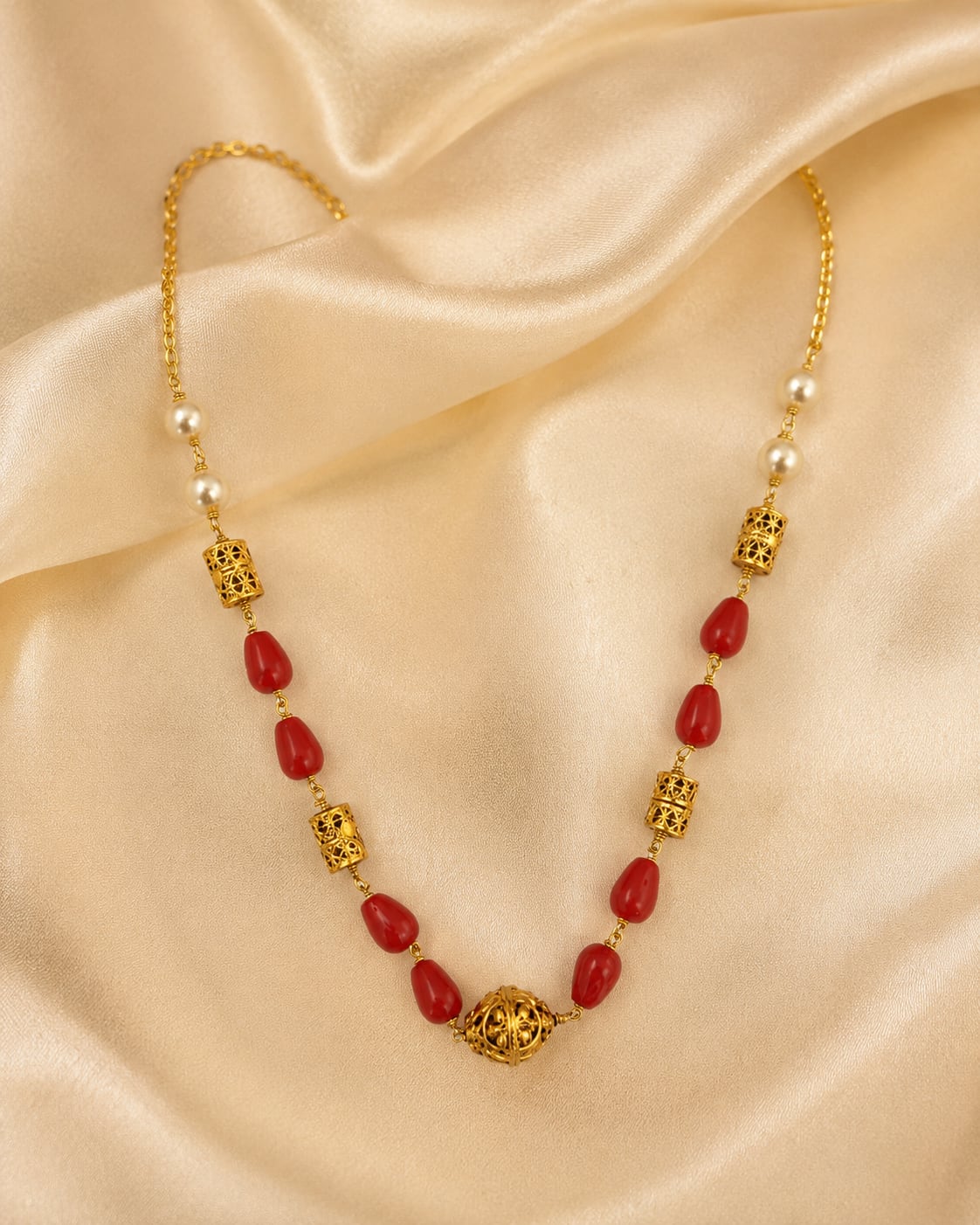 FeelOri gold-polished necklace styled with saree fabric for Indian occasion wear