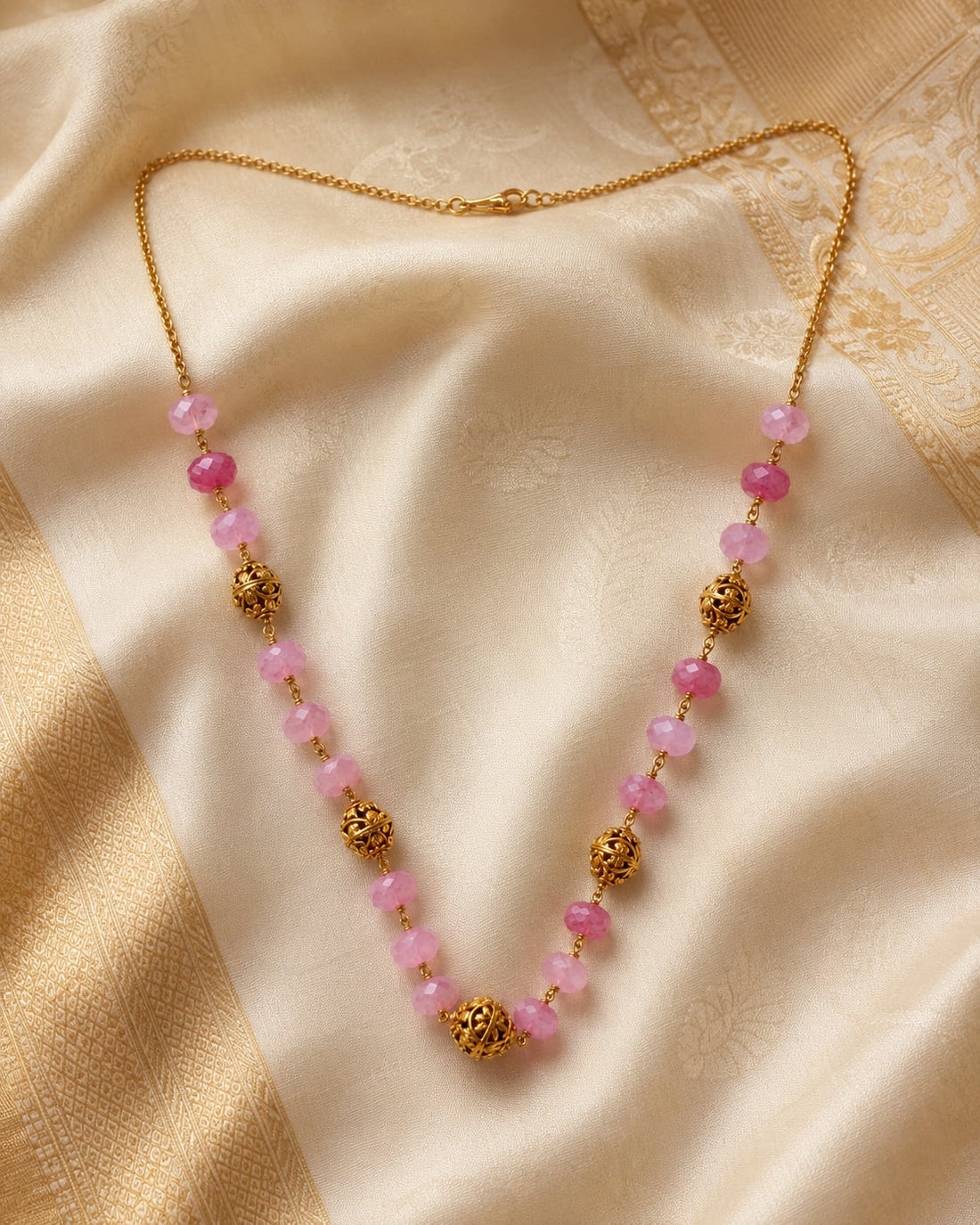 FeelOri gold-polished necklace styled with saree fabric for Indian occasion wear