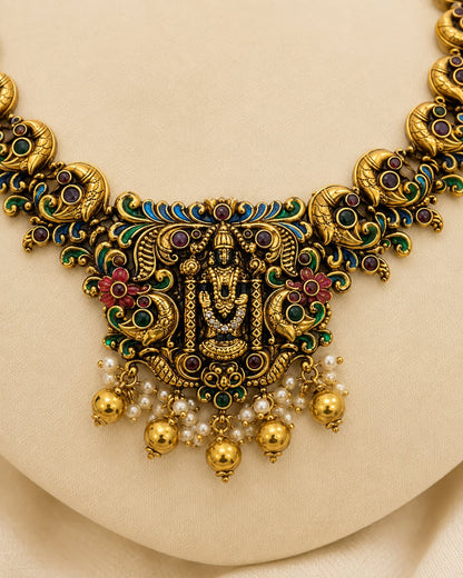 FeelOri gold-polished necklace set with matching earrings styled with saree fabric for Indian occasion wear