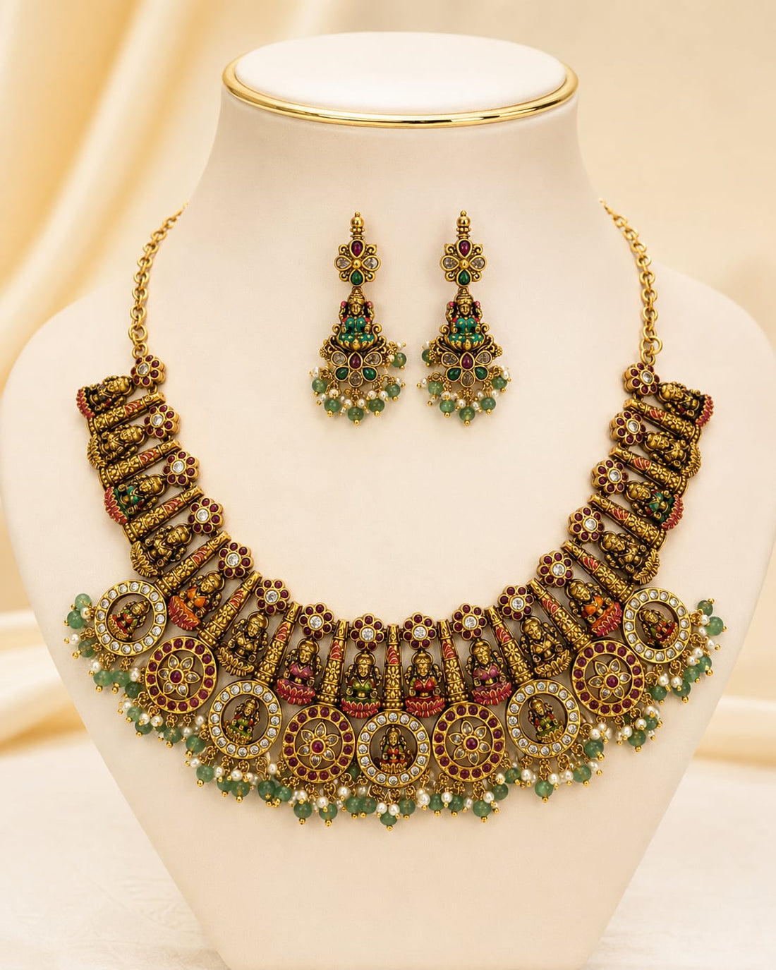 FeelOri gold-polished necklace set with matching earrings on jewellery display