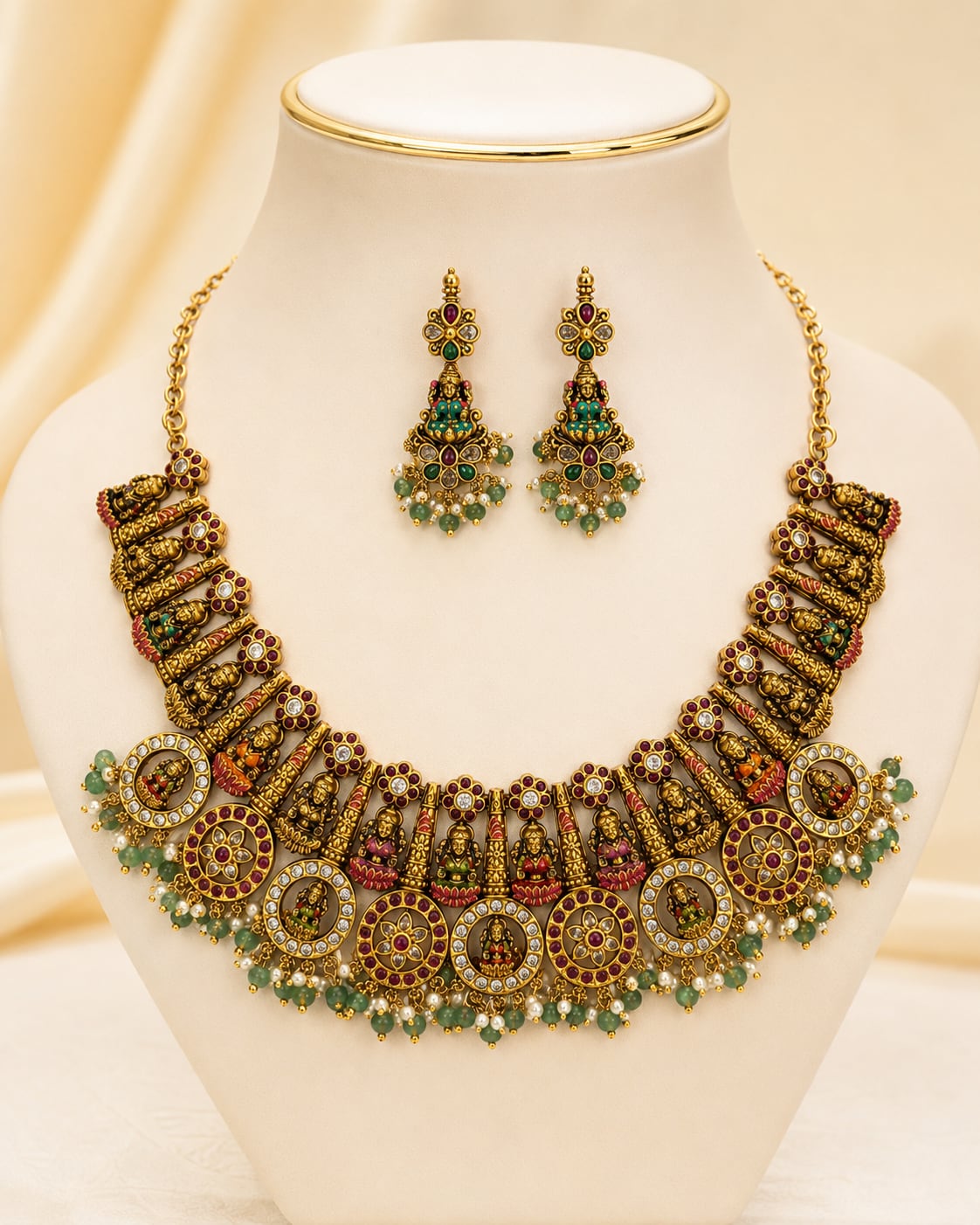 FeelOri gold-polished necklace set with matching earrings on jewellery display