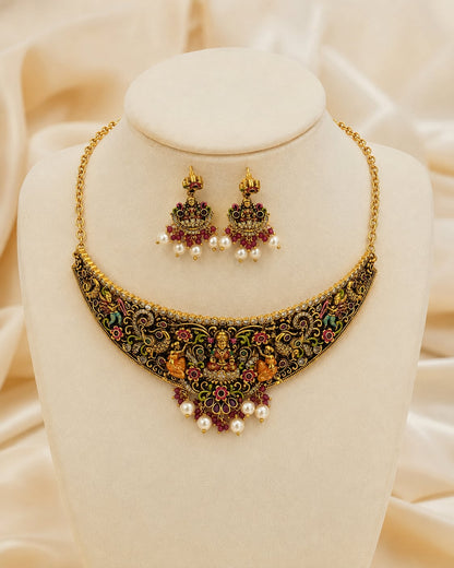FeelOri gold-polished necklace set with matching earrings on jewellery display