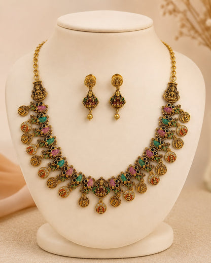 FeelOri gold-polished necklace set with matching earrings on jewellery display