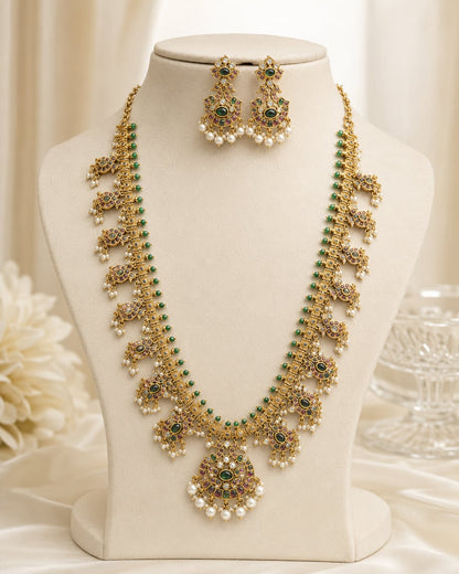 FeelOri gold-polished necklace set with matching earrings on jewellery display