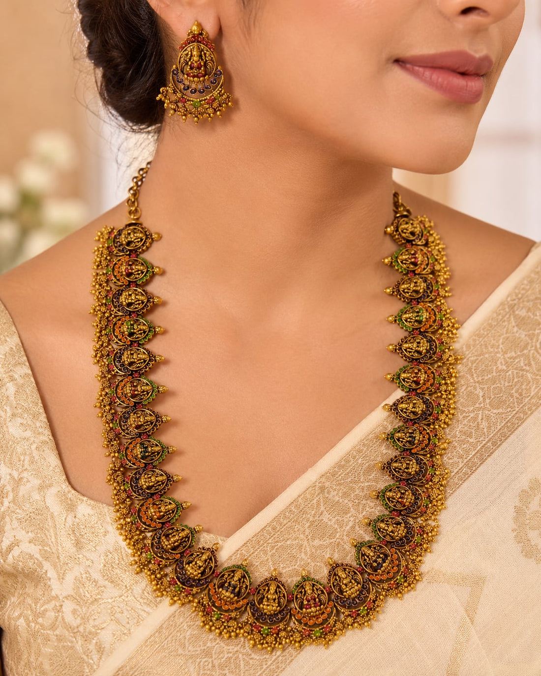FeelOri gold-polished necklace set with matching earrings styled with Indian occasion wear
