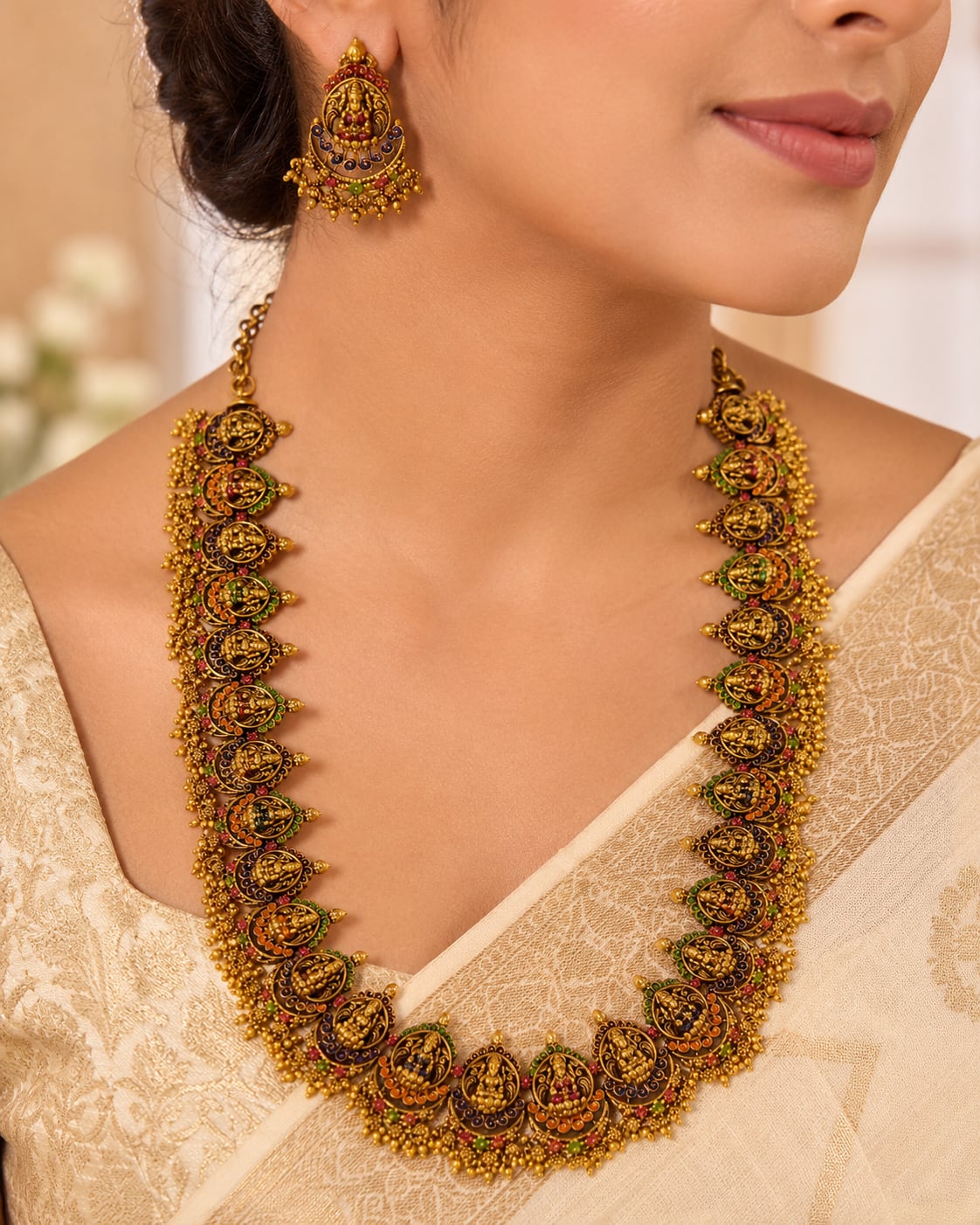 FeelOri gold-polished necklace set with matching earrings styled with Indian occasion wear