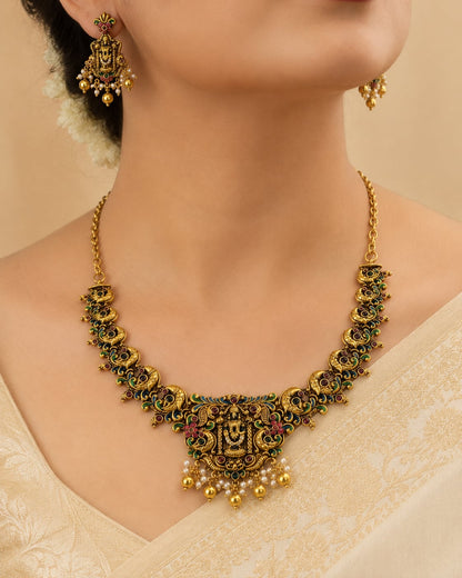 FeelOri gold-polished necklace set with matching earrings styled with Indian occasion wear