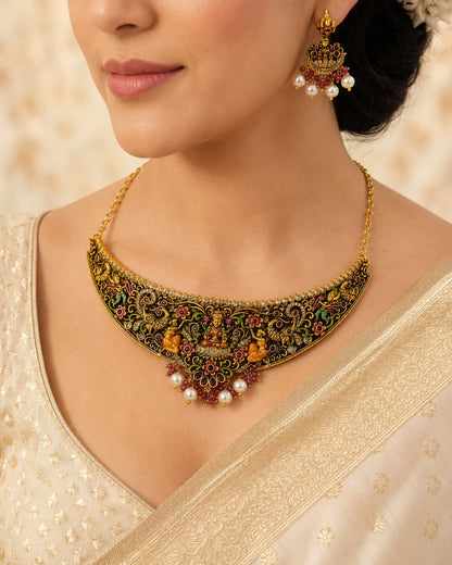 FeelOri gold-polished necklace set with matching earrings styled with Indian occasion wear