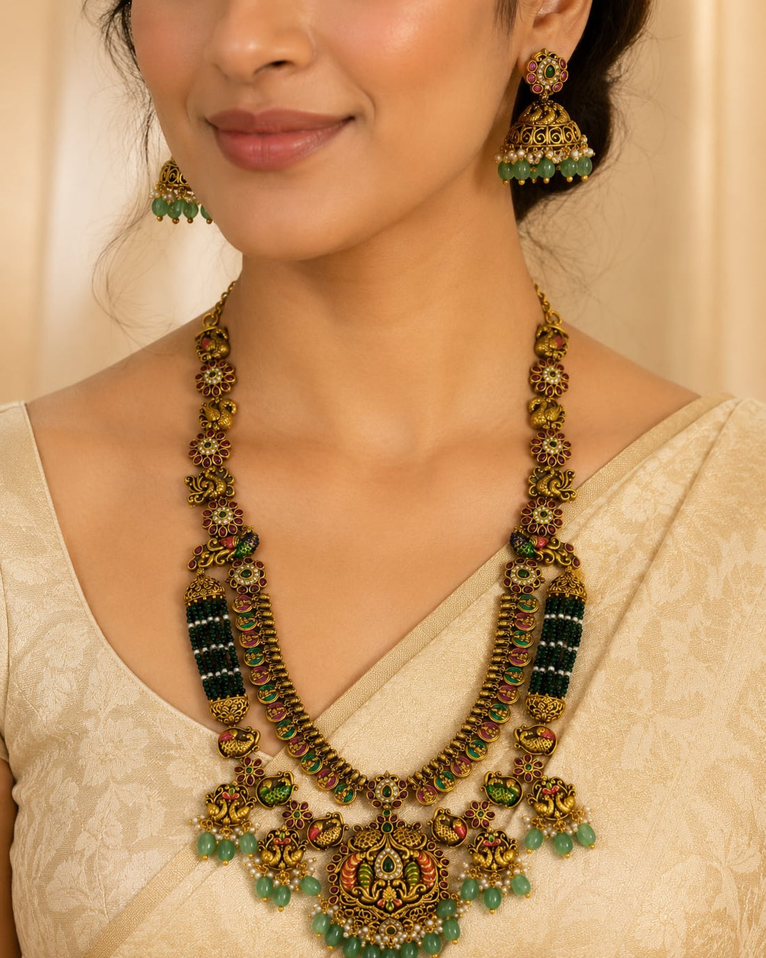 FeelOri gold-polished necklace set with matching earrings styled with Indian occasion wear