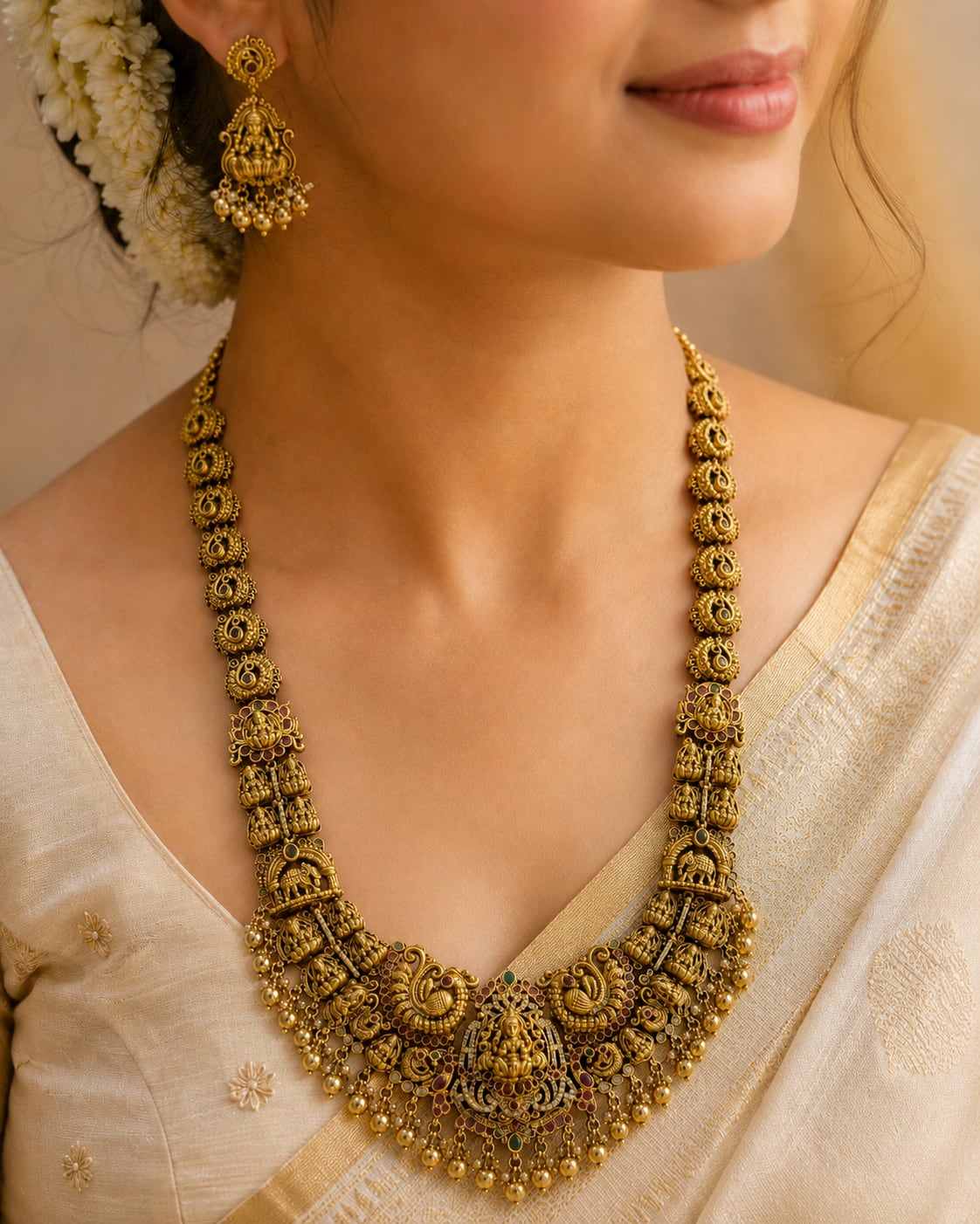FeelOri gold-polished necklace set with matching earrings styled with Indian occasion wear