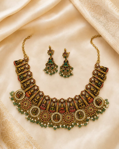 FeelOri gold-polished necklace set with matching earrings styled with saree fabric for Indian occasion wear