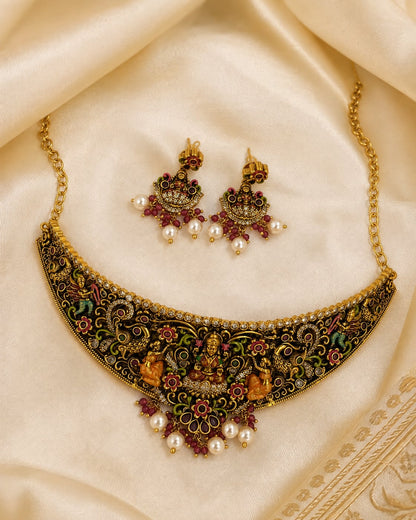 FeelOri gold-polished necklace set with matching earrings styled with saree fabric for Indian occasion wear