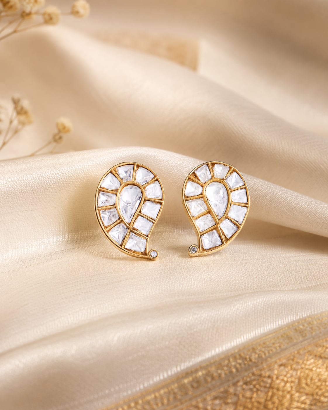 FeelOri gold-polished stud earrings styled with saree fabric for Indian occasion wear