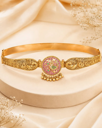 FeelOri gold-polished vaddanam waist belt on jewellery display