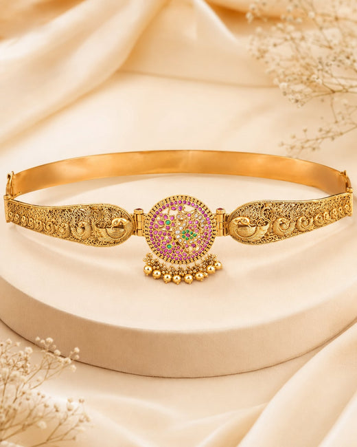 FeelOri gold-polished vaddanam waist belt on jewellery display