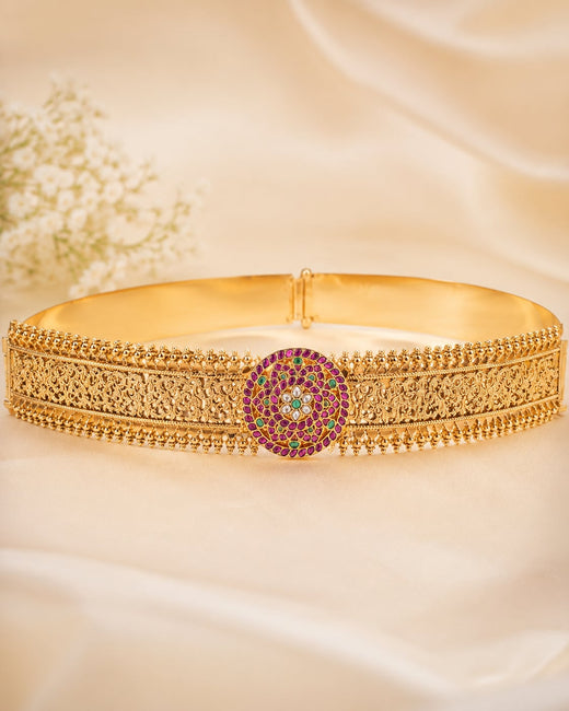FeelOri gold-polished vaddanam waist belt on jewellery display