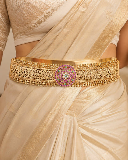 FeelOri gold-polished vaddanam waist belt styled with Indian occasion wear