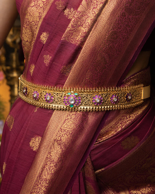 FeelOri gold-polished vaddanam waist belt styled with Indian occasion wear