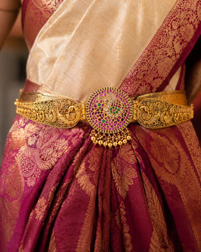 FeelOri gold-polished vaddanam waist belt styled with saree fabric for Indian occasion wear