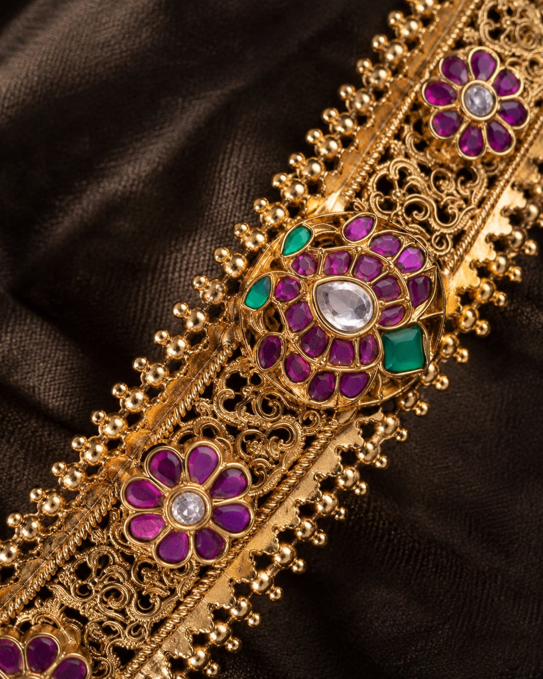 FeelOri gold-polished vaddanam waist belt styled with saree fabric for Indian occasion wear