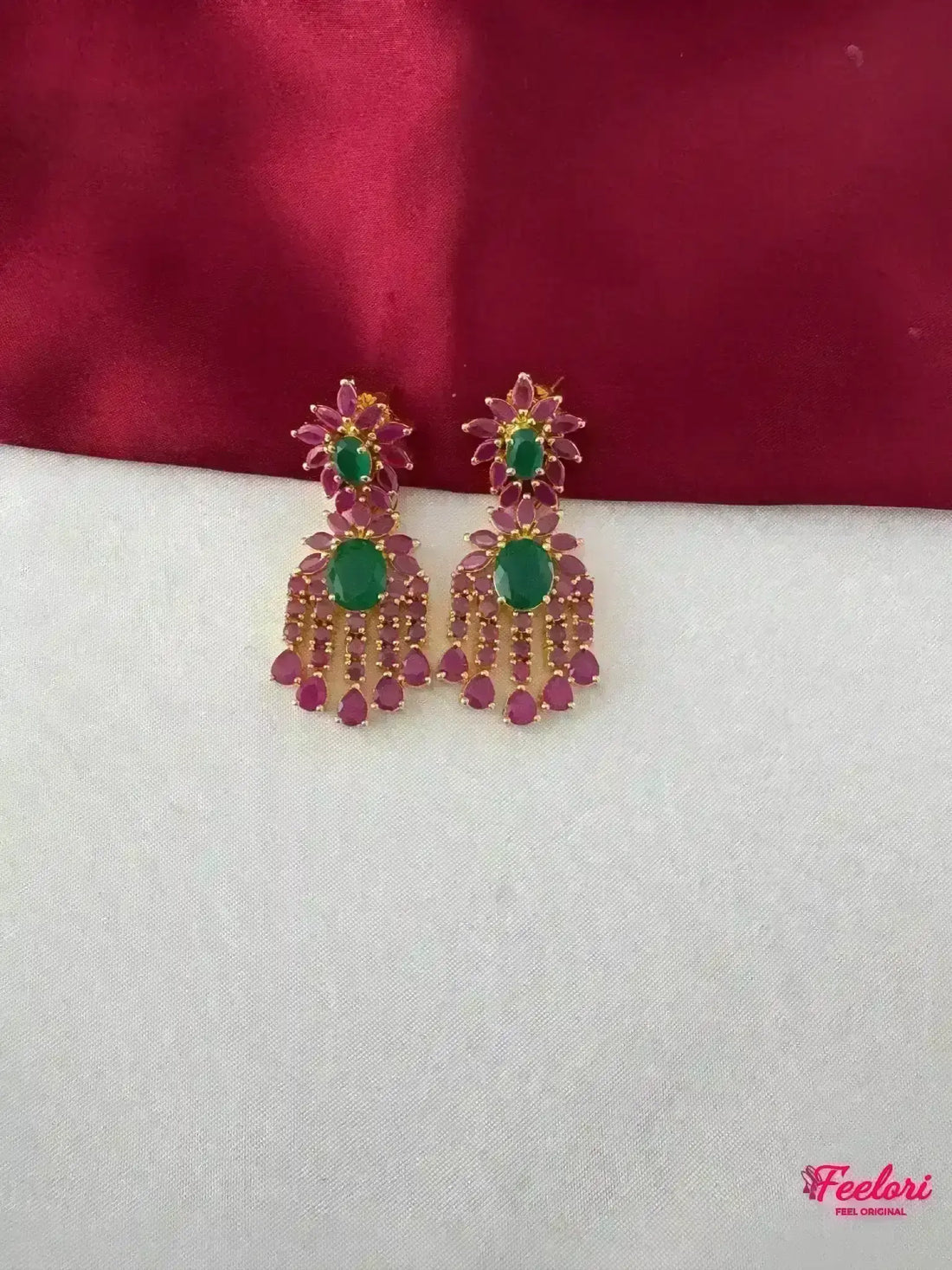FeelOri Gold Plated Ruby Emerald Petal Drop Earrings - Close-up view highlighting the Ruby CZ and emerald stones and delicate gold plating.