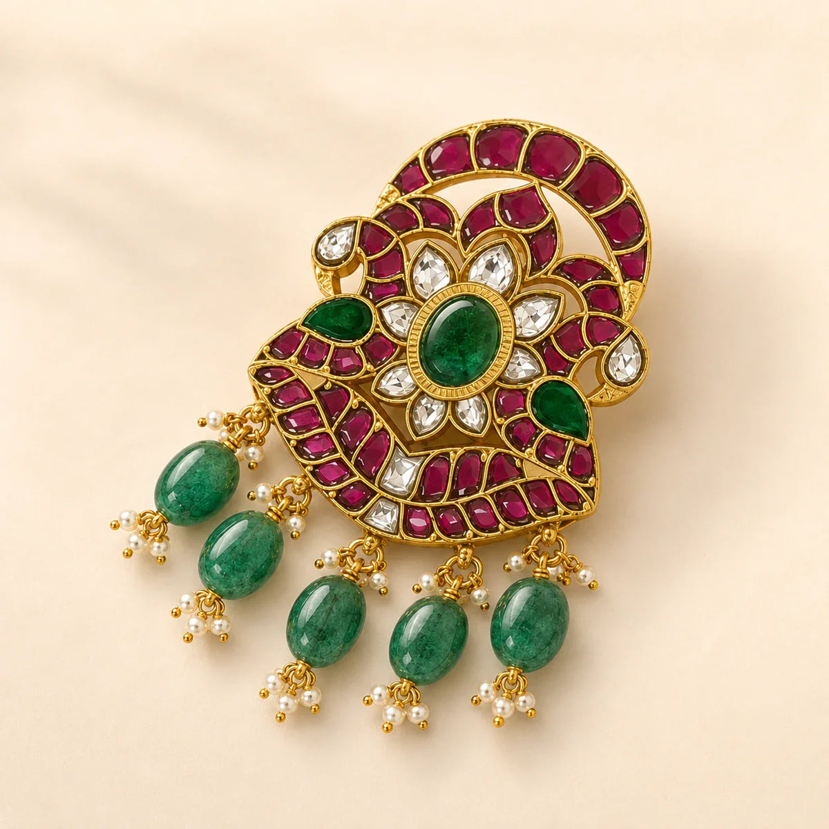 Angled view of the Iruttai Mayil Padmam pendant showing twin peacock, lotus and green bead details
