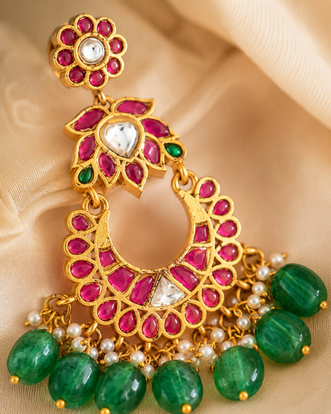 FeelOri jadau kundan earrings stone setting, ear-chain or earring construction, and gold-polished detail