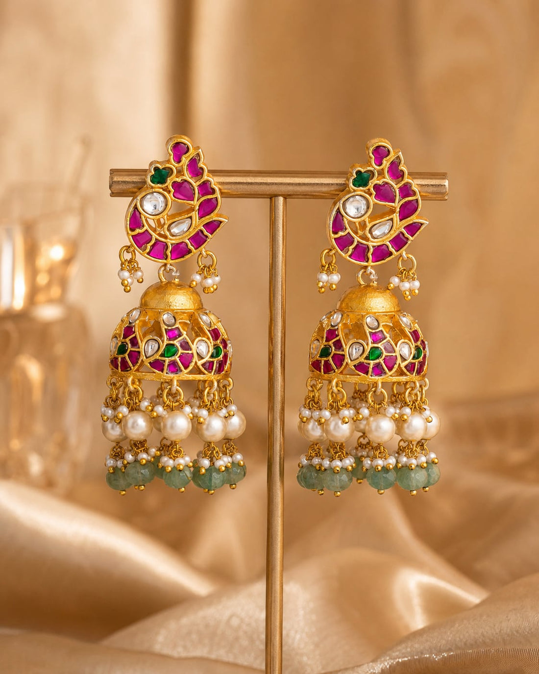 FeelOri jadau kundan jhumka earrings stone setting, ear-chain or earring construction, and gold-polished detail