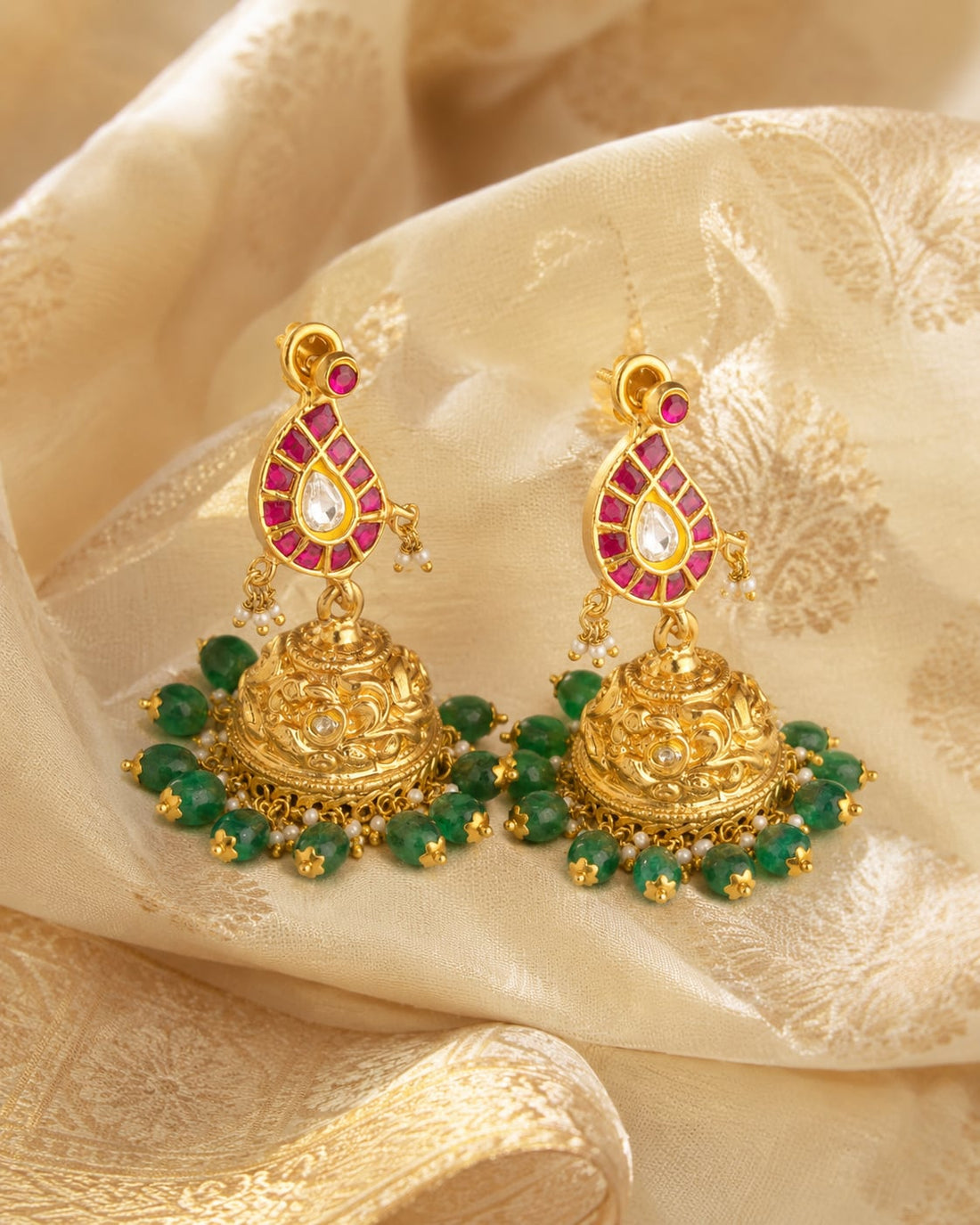 FeelOri jadau kundan jhumka earrings styled with saree fabric for Indian occasion wear
