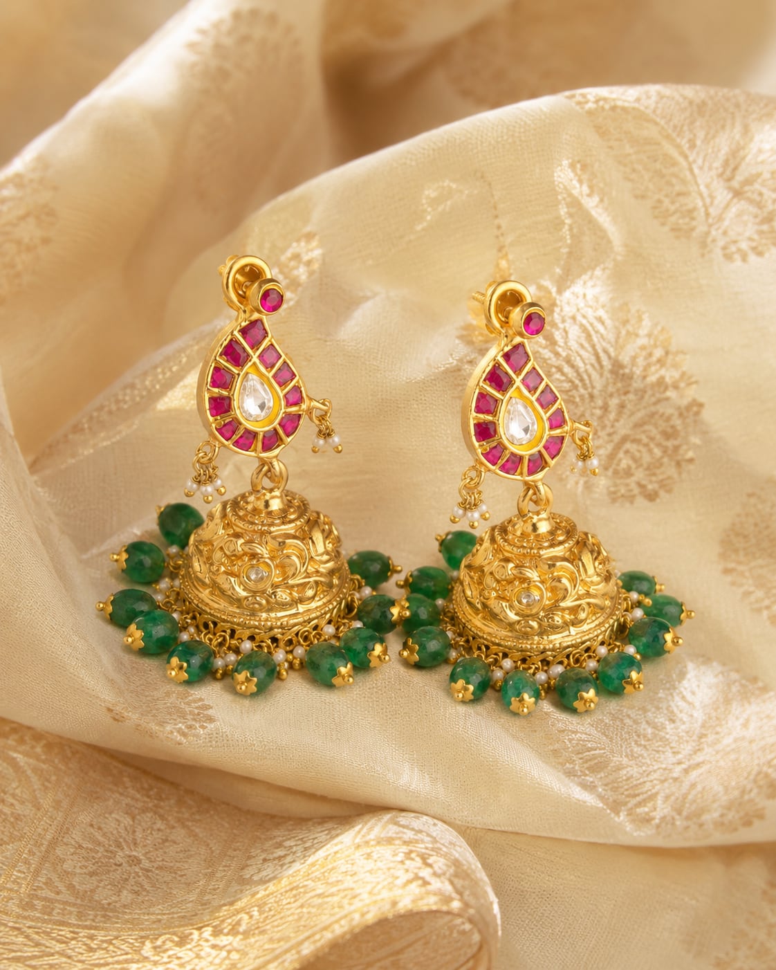FeelOri jadau kundan jhumka earrings styled with saree fabric for Indian occasion wear