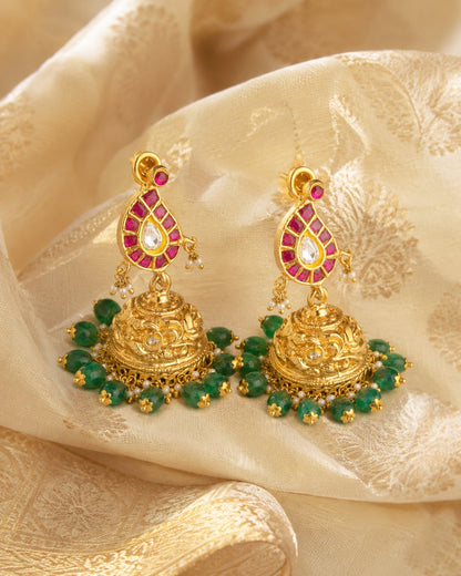FeelOri jadau kundan jhumka earrings styled with saree fabric for Indian occasion wear