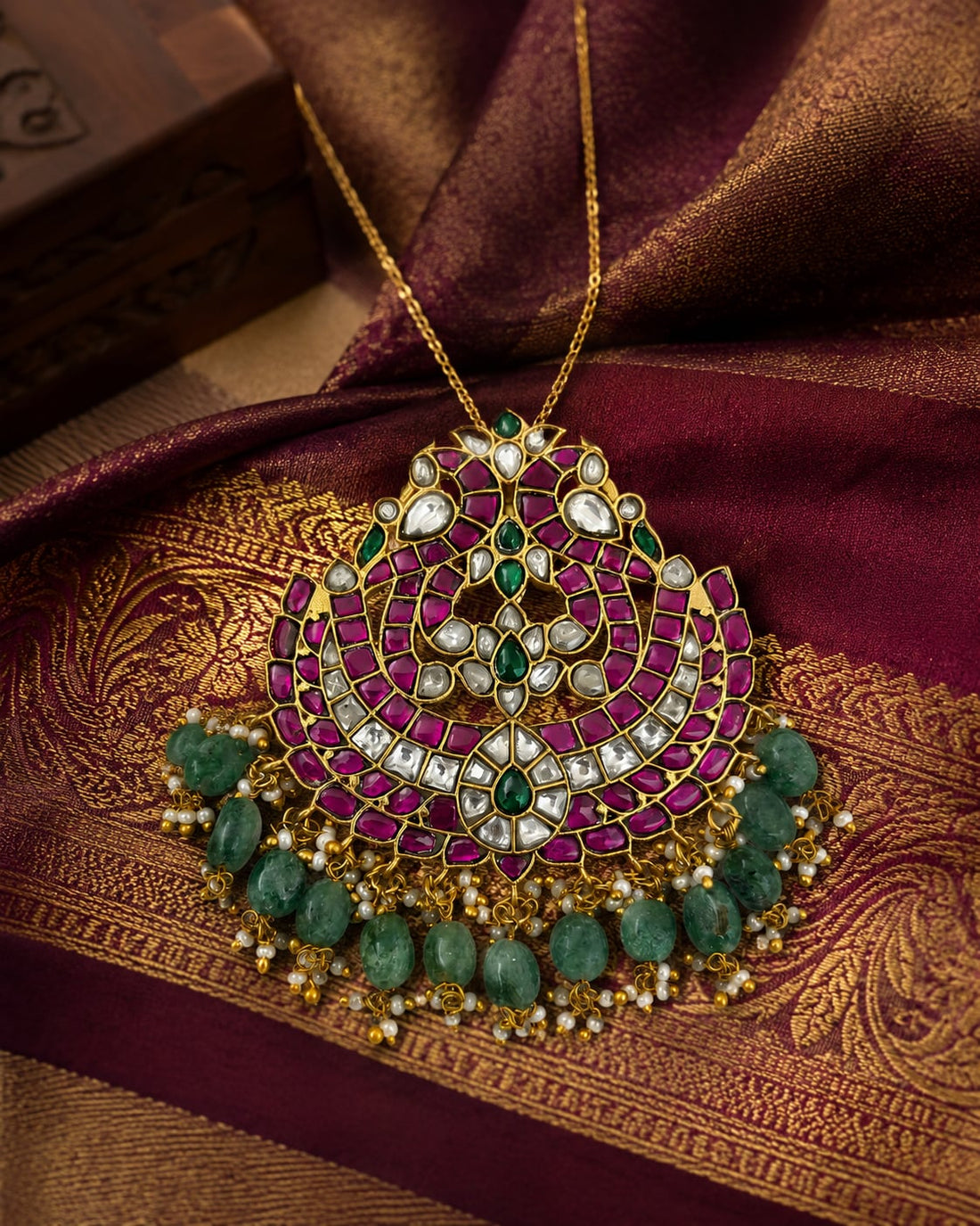 FeelOri jadau kundan pendant styled with saree fabric for Indian occasion wear