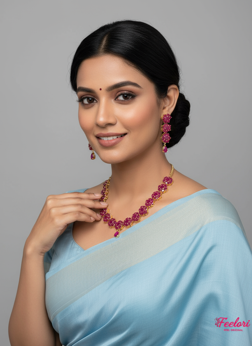 FeelOri Gold Plated Ruby Necklace Set - Model wearing elegant set with light blue traditional saree.
