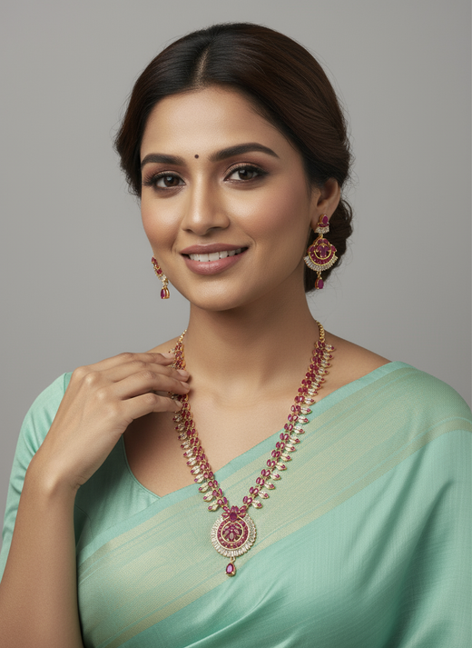 FeelOri Gold Plated Ruby & CZ Petal Motif Necklace Set - Model wearing elegant set with light green saree.