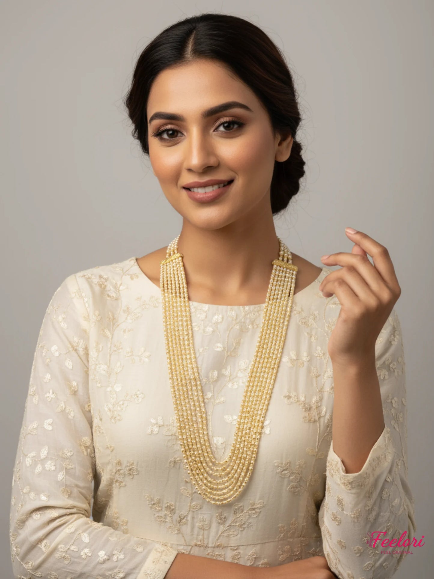 FeelOri Gold Plated Seven-Strand Necklace - Model wearing graded Mother of Pearls design in traditional outfit