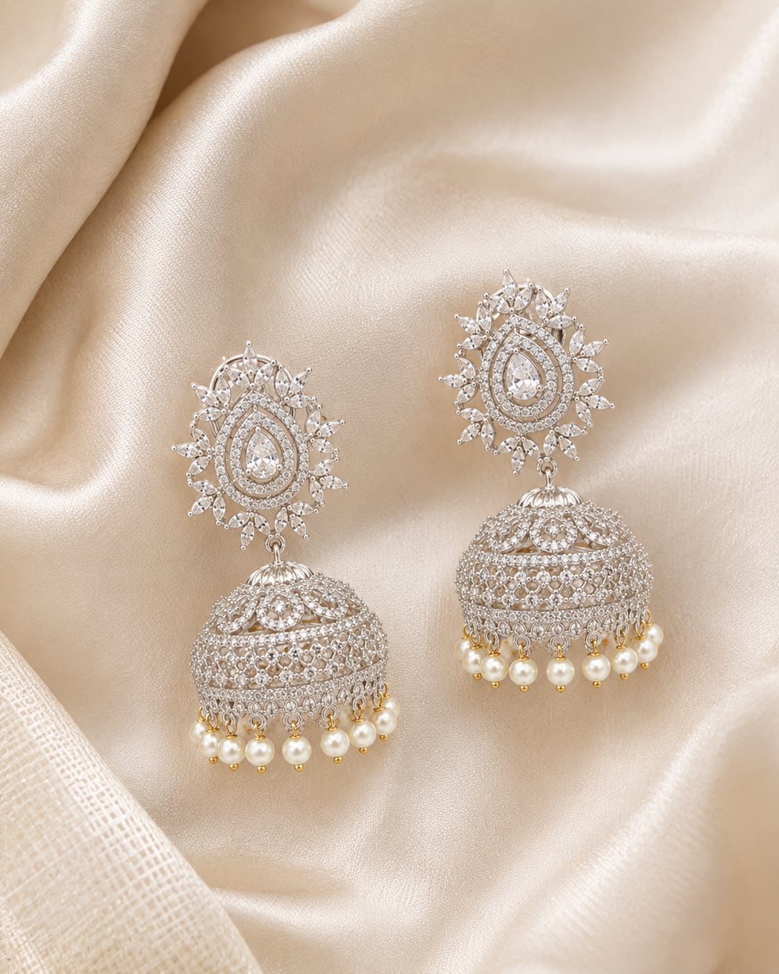 FeelOri Oval Halo Silver Rhodium CZ Jhumka Earrings with Pearl Look Drops - silk styling view