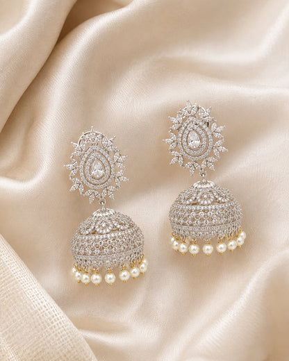 FeelOri Oval Halo Silver Rhodium CZ Jhumka Earrings with Pearl Look Drops - silk styling view
