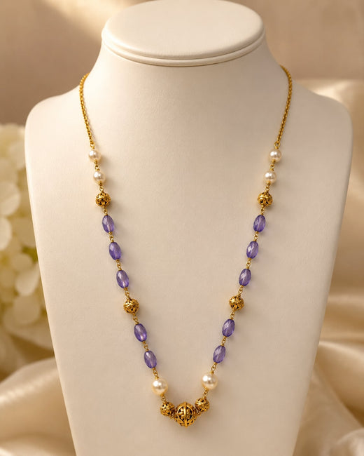 FeelOri gold-polished necklace on jewellery display