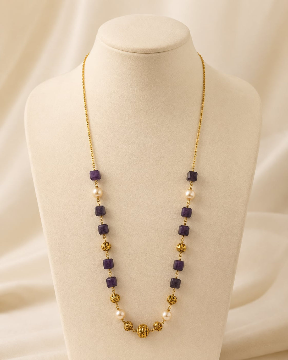 FeelOri Deep Plum Cube Bead and Pearl-Look Necklace on a necklace display
